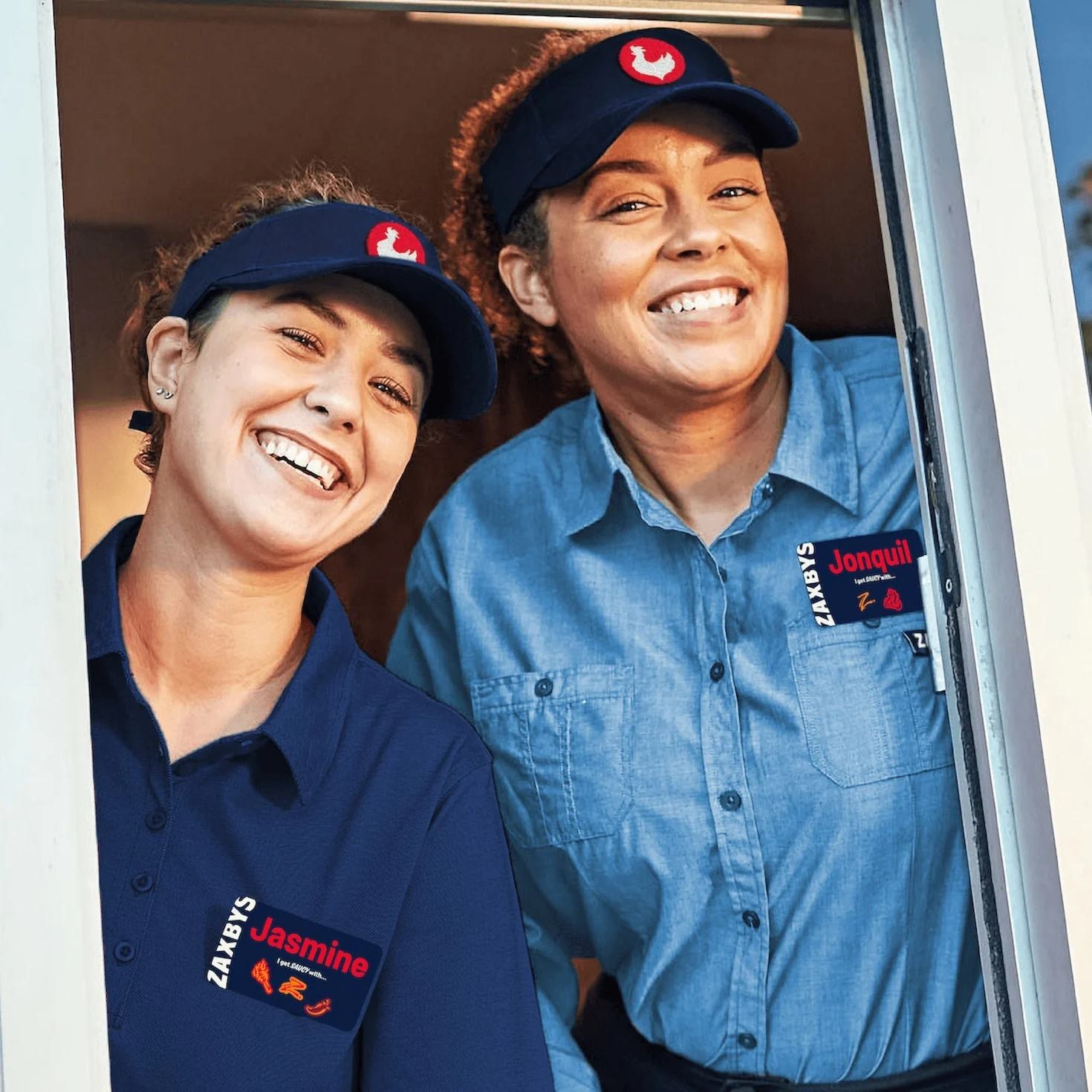 Two smiling Zaxby's team members